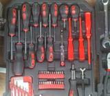 A Box of Tools including Ratchet Wrench