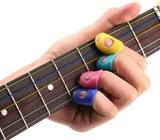 4pcs Fingertip Protector Fingerstall Silicone Guitar String Finger