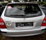 Clean tokunbo direct  clear Mazda 323 no condition buy and used