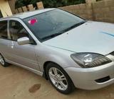 Tokunbo Mitsubishi Lancer manual for sale everything working perfectly