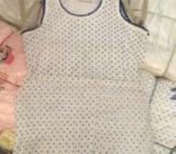 Orginal singlets for babies. We sell is dozens